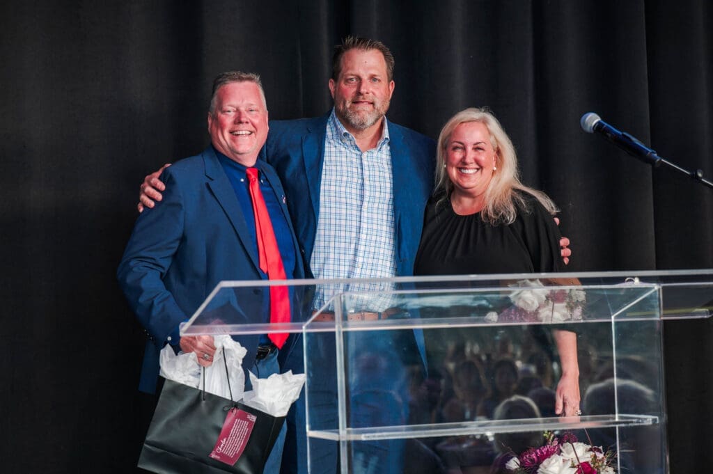 Charlie de Kanter (left) and Sonya Nicholson, who chaired the 2025 Pavilion Partners Wine Dinner, with Jeff Young, president and CEO of The Cynthia Woods Mitchell Pavilion. (Photo by The Cynthia Woods Mitchell Pavilion)