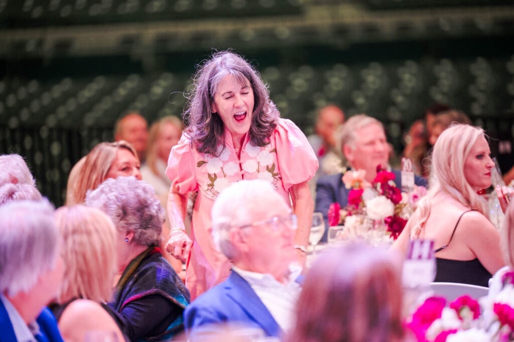Kathryn Painter won the diamond tennis bracelet from Robichau's Jewelers in the raffle during the Pavilion Partners Wine Dinner.  (Photo by The Cynthia Woods Mitchell Pavilion)