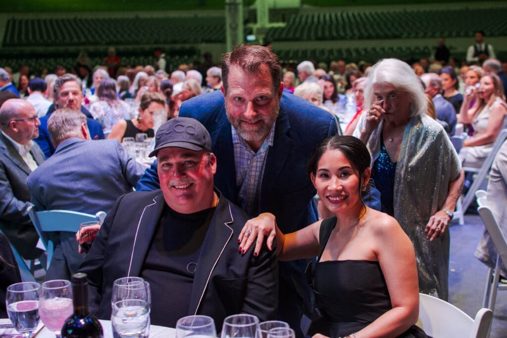 Aven and Tracey McBride with Jeff Young at the 2025 Pavilion Partners Wine Dinner. (Photo by The Cynthia Woods Mitchell Pavilion)