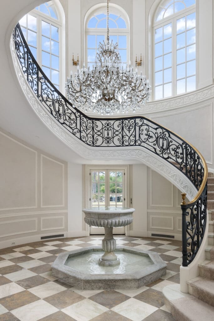 The French-style chateau "blends intimacy with grandeur." (Photo by Briggs Freeman Sotheby's International Realty)