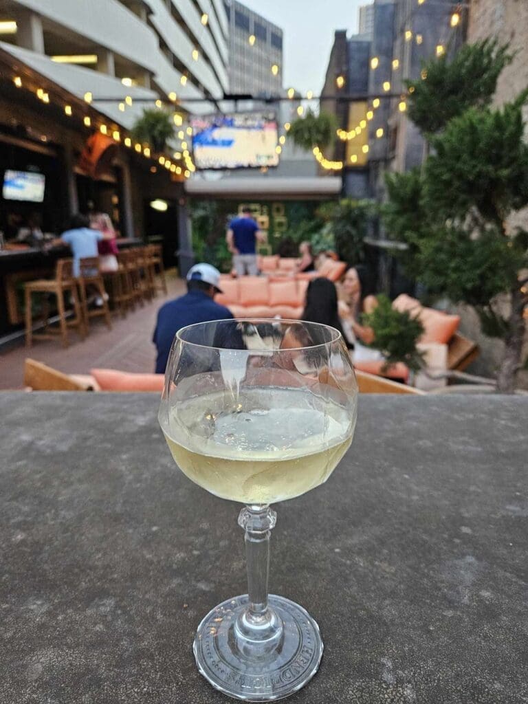 The stylish rooftop bar at The Archibald delivers handcrafted cocktails, city views, and bold flavors from Son of a Baker. (Photo by Edward Brown)
