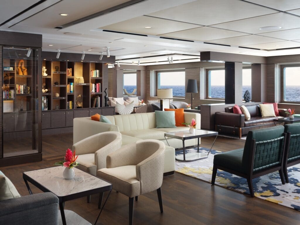 The Living Room aboard the Ritz-Carlton yacht Evrima provides a private yacht like feel to the 624 foot vessel.