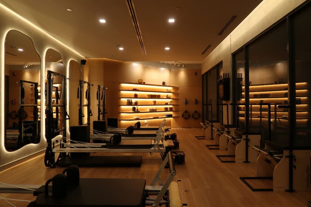 The thoughtfully designed 3,400-square-foot space offers group and private reformer sessions, as well as heated mat Pilates. (Photo by Forma Pilates)
