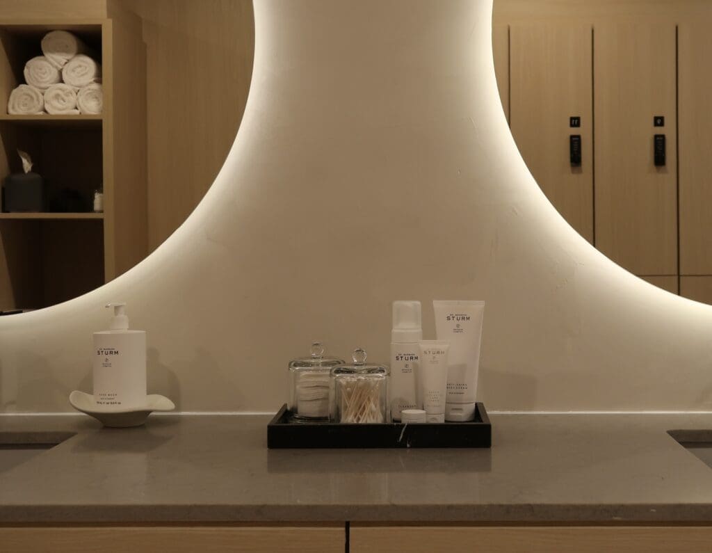 Luxurious spa experience amenities include a curated selection of Dr. Barbara Sturm skincare products, private lockers, spa-inspired showers, and towel service. (Photo by Forma Pilates)