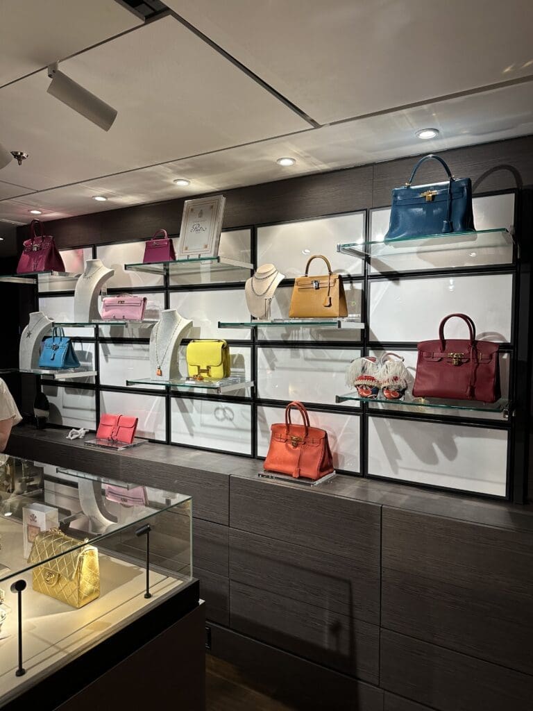 For one night only, Evrima staff brings out the highly coveted designer handbags — Hermès, Chanel, etc. – for serious shoppers.
