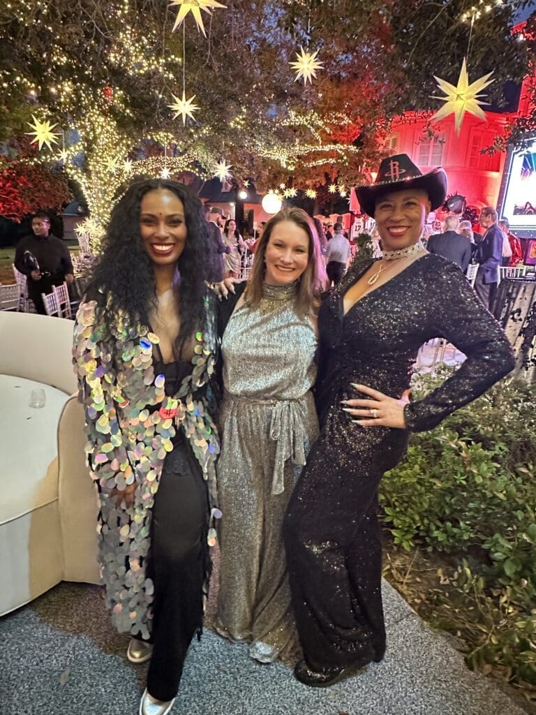 Roslyn Clowers, Rockets president of business operations Gretchen Sheirr, Lawanda Laases at the Rockets Clutch City Foundation gala held on the grounds of the Fertitta family home in River Oaks. (Photo by Shelby Hodge)
