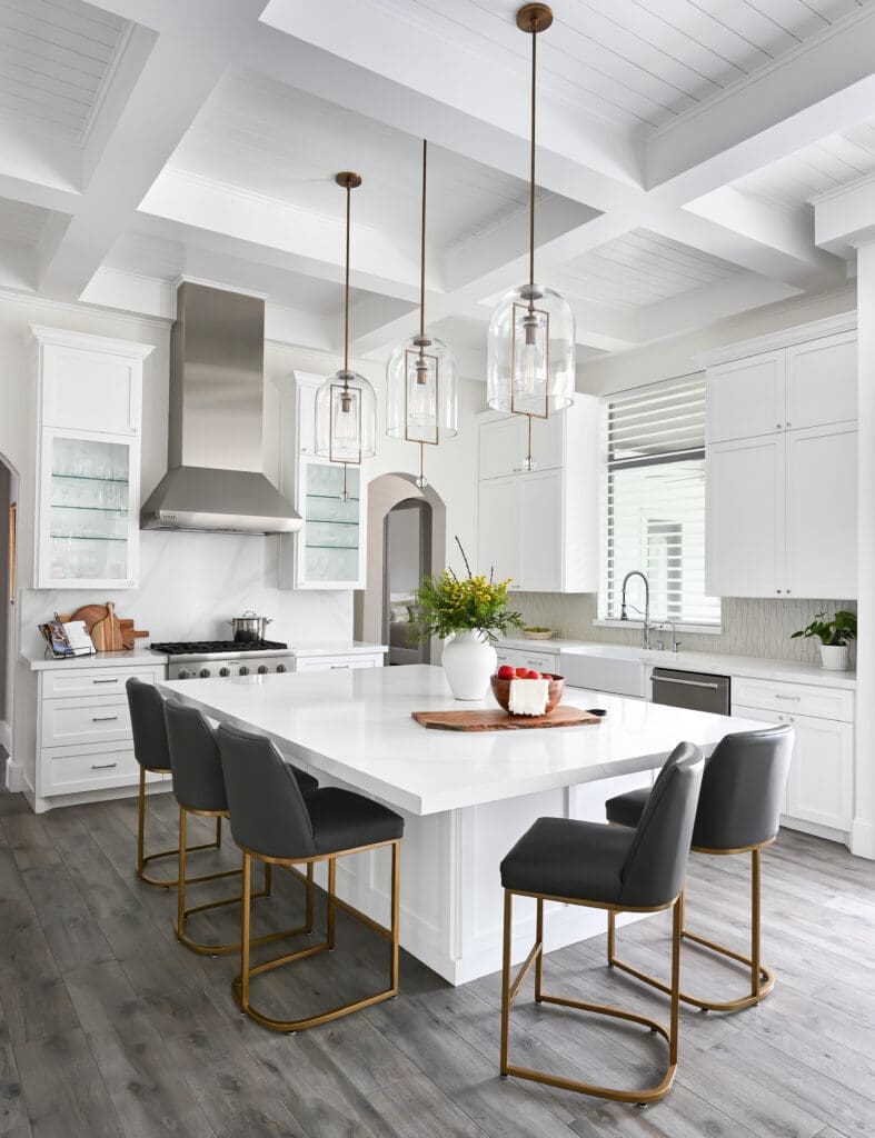 The center island offers ample space for casual dining and conversation. (Photo by Charbonneau Interiors)