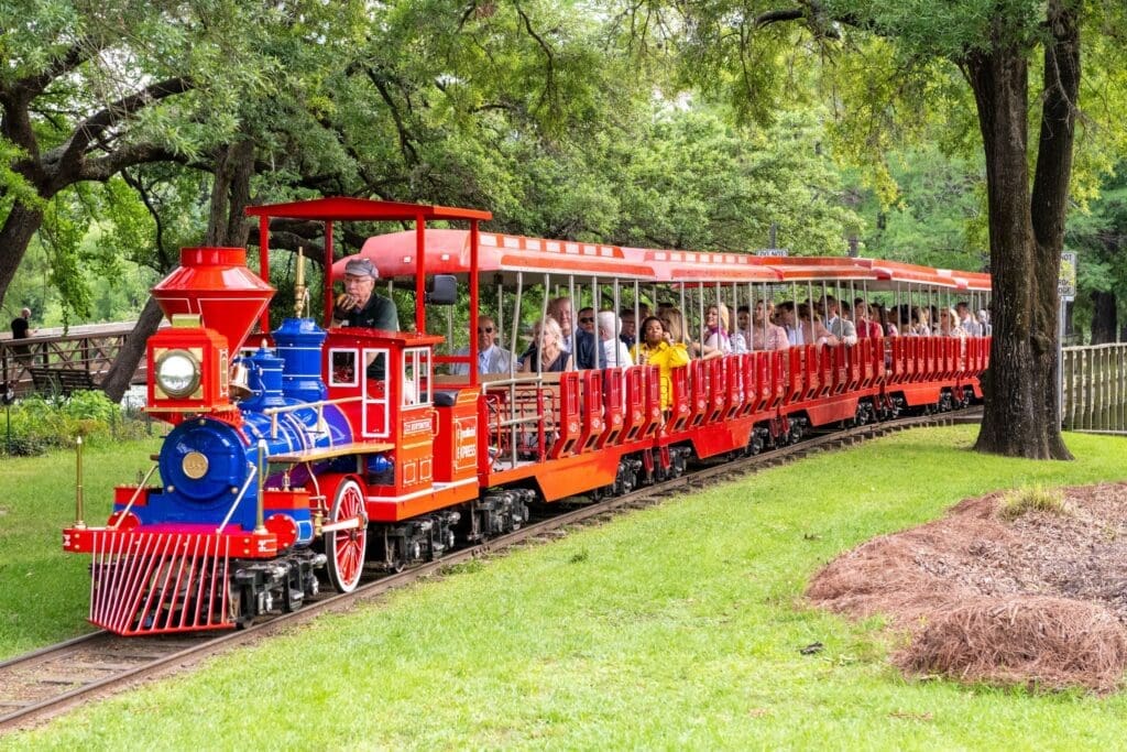 The Hermann Park Railroad transports Evening in the Park guests on a ride across the verdant acreage. (Photo by Jacob Power)