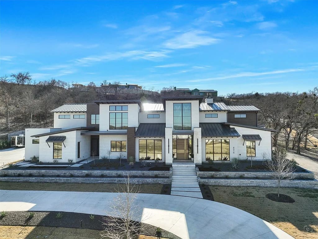 Set on over an acre in Montrachet, 4316 Bellecour Trail showcases soft contemporary architecture with clean symmetry and wide-open outdoor space. (Courtesy)