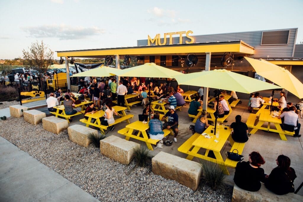 Located along the Trinity River in Clearfork, dogs run the show and humans get to tag along at MUTTS Canine Cantina. (Courtesy)