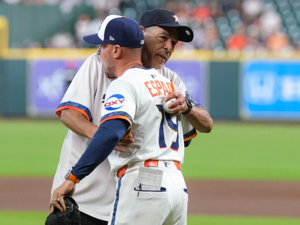 University of Houston coach Kelvin Sampson and Astros manager Joe Espada have a real friendship. (Photo by F. Carter Smith)