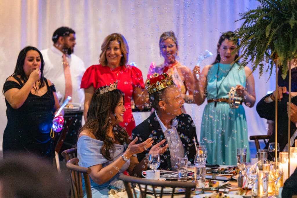 Each live auction winner was celebrated with fun fanfare, like whistles, bubbles, crowns and a round of applause. (Photo courtesy of TWCA)