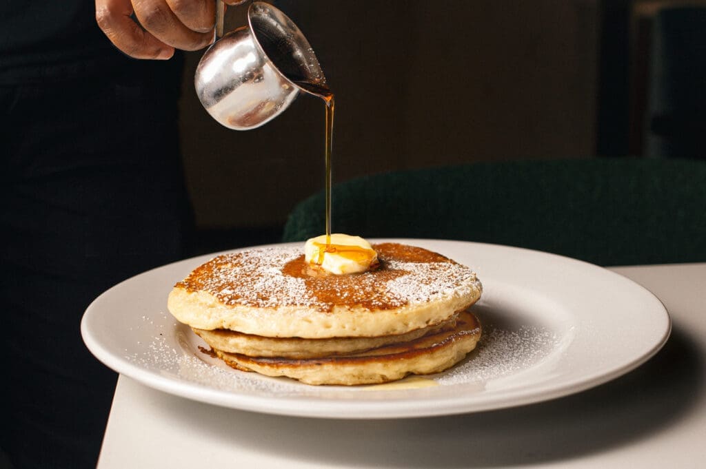 The Charlotte recently launched weekend brunch with cinnamon roll pancakes on the menu. (Photo by Dan Pagnett)
