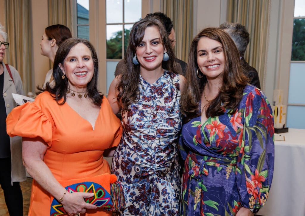 HCCC executive director Leila Cartier featured (center) at the Spring Luncheon.Inspired by an intrinsic painterly drive, Cartier’s world is informed by a love of aesthetics and design. She holds an MFA in painting and drawing from the School of Art Institute of Chicago. Respected as bringing an entrepreneurial spirit to her role, Cartier joined HCCC as executive director in April of 2023. 