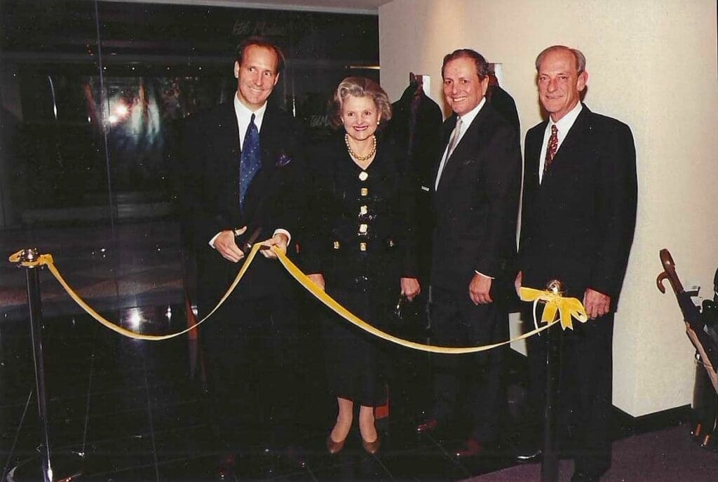 Crawford Brock, Caroline Rose Hunt, Neil Fox, and Jim Noack at a Stanley Korshak ribbon cutting ceremony in the early 1990s. (Courtesy)