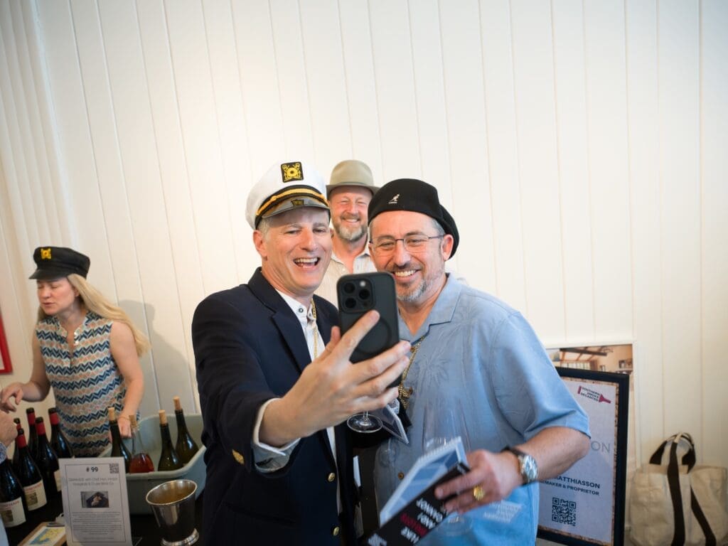 Southern Smoke finance committee chair Ben Fink, winemaker Steve Matthiasson, photo bomber Adam Stern at the Southern Smoke Foundation 'Decanted' fundraiser (Photo by Daniel Ortiz)