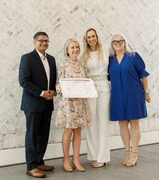 Dr. Giridhar Vedala, Kerrie Guerrero, Missy Herndon and Anita Phillips. Guerrero was awarded the Woman Who Cares award. (Photo courtesy of Interfaith)
