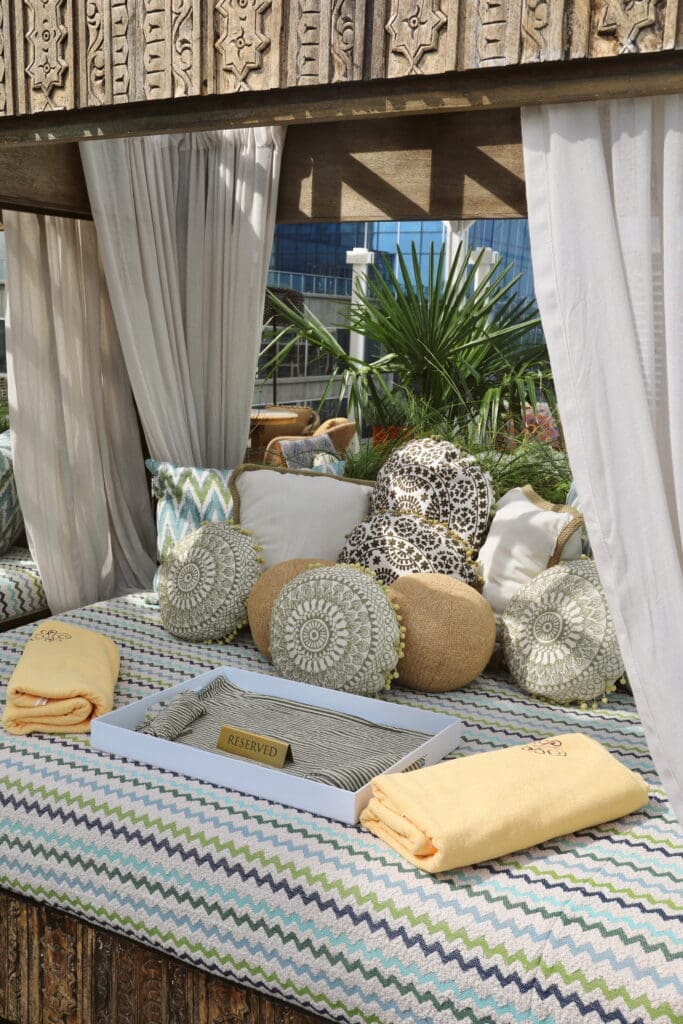 Missoni's striking color palette and signature patterns will adorn branded lounger covers that surround the property's infinity-edge pool. (Photo by Hôtel Swexan)
