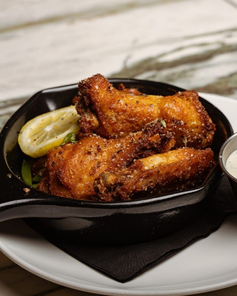 Start your meal at Winsome Prime with the truffle lemon pepper wings. (Courtesy)
