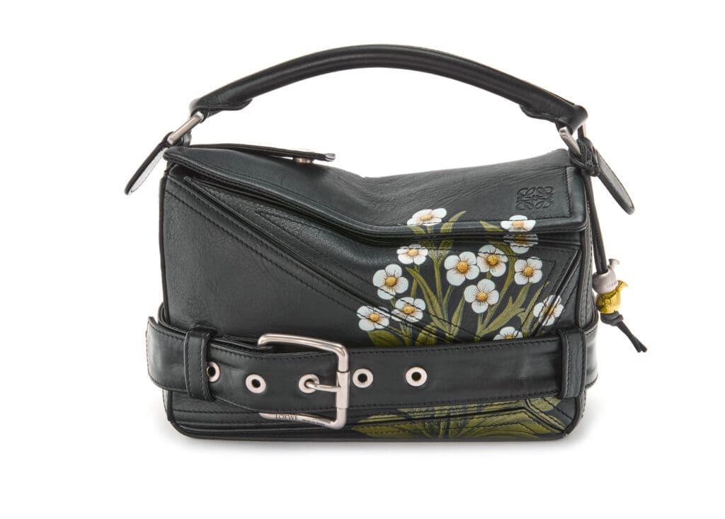 The "William Morris" Re-edition juxtaposes nature and punk, as if wildflowers were painted on a leather jacket. (Photo by Loewe)
