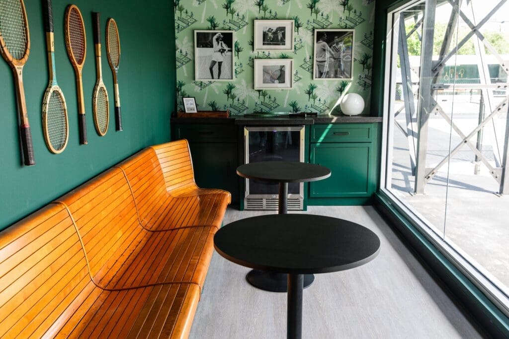 Outside at Solarium, you will find The Courts, as well as five bays crafted from repurposed shipping containers, each offering a private, glass-front space to watch a match in air-conditioned comfort. (Photo by Becca Wright)