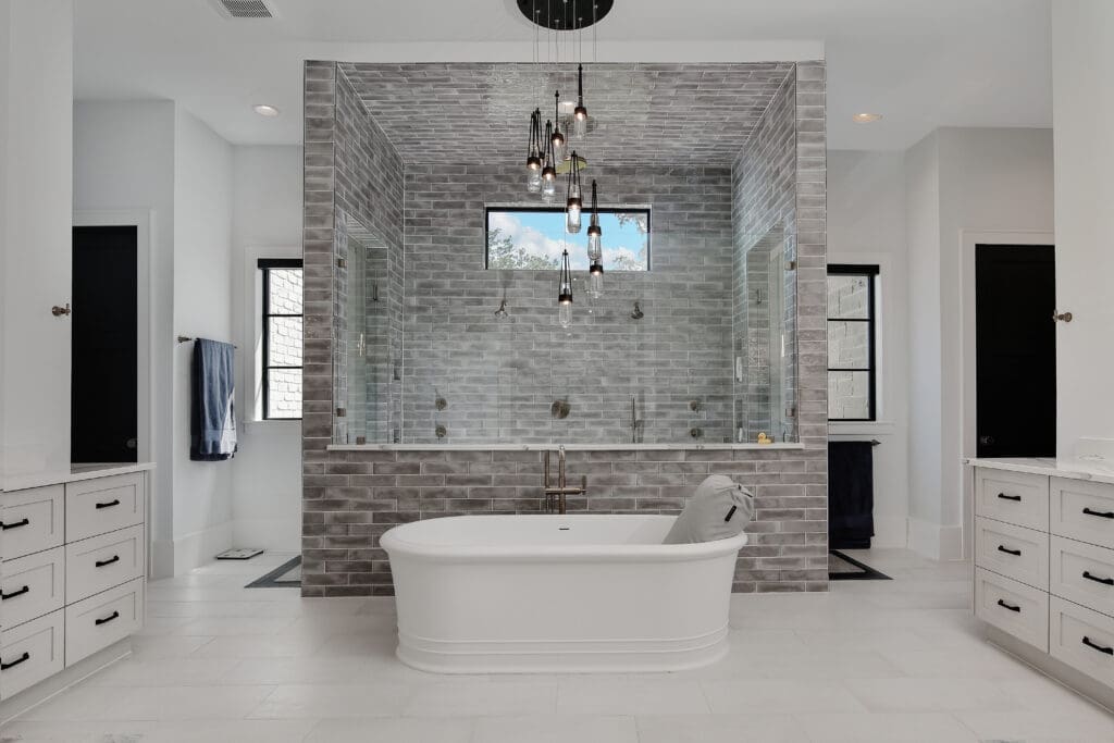 The primary bath as a free standing tub, enormous shower and two walk in closets.