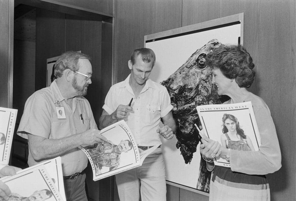 The opening reception in 1985 included numerous sitters next to their portraits.  (Photo by Amon Carter Museum of American Art, Fort Worth, Texas)