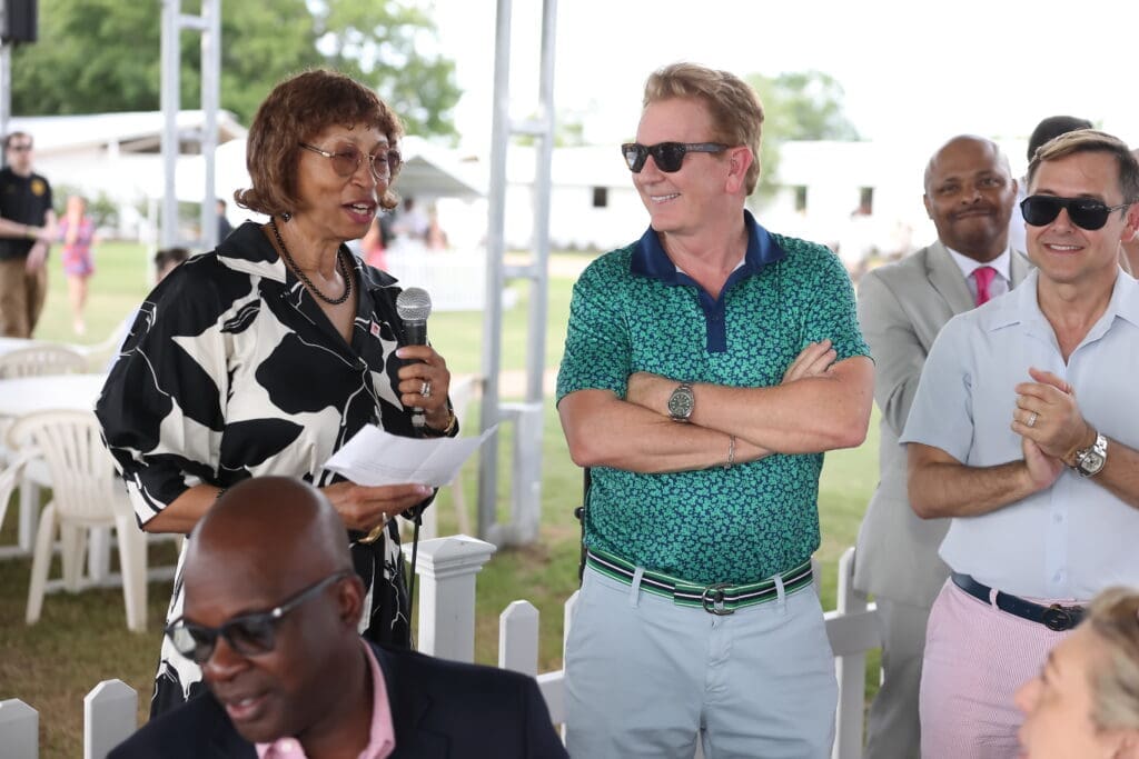 Career and Recovery Resources board president Jackie Watson, chairs Frank Billingsley & Kevin Gilliard at the 'Picnic at the Polo Club' event (Photo by Quy Tran)