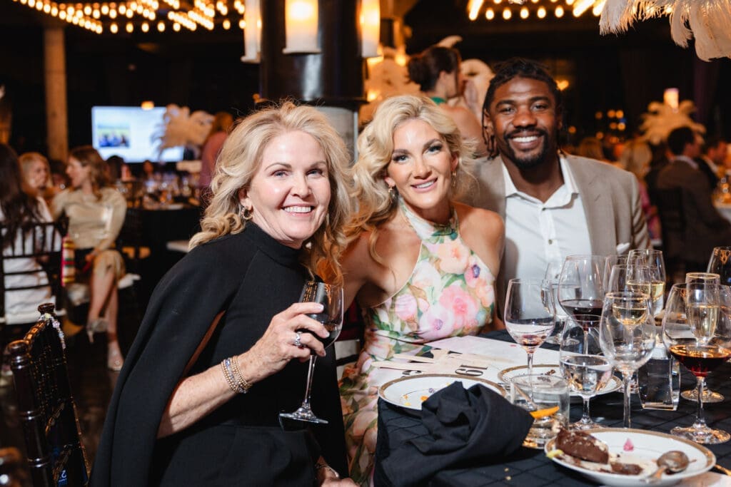 Mary Beth Robinson, Meghan and Jerry Hughes at The Women's Fund 10th annual wine dinner. (Photo by Johnny Than)