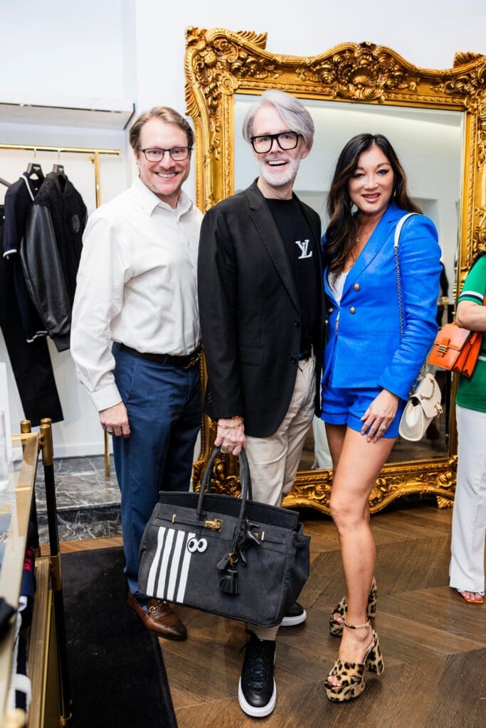 Matt Burrus & Michael Pearce, Angela Nichols at Balmain in River Oaks District saluting Operation Smile honorees. 