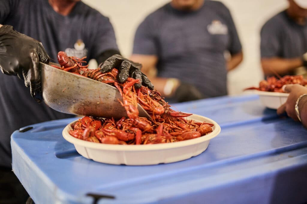 More than 6,500 pounds of boiled crawfish served at Cotton Holdings' CrawFest fundraiser (Photo by courtesy of Cotton Holdings)