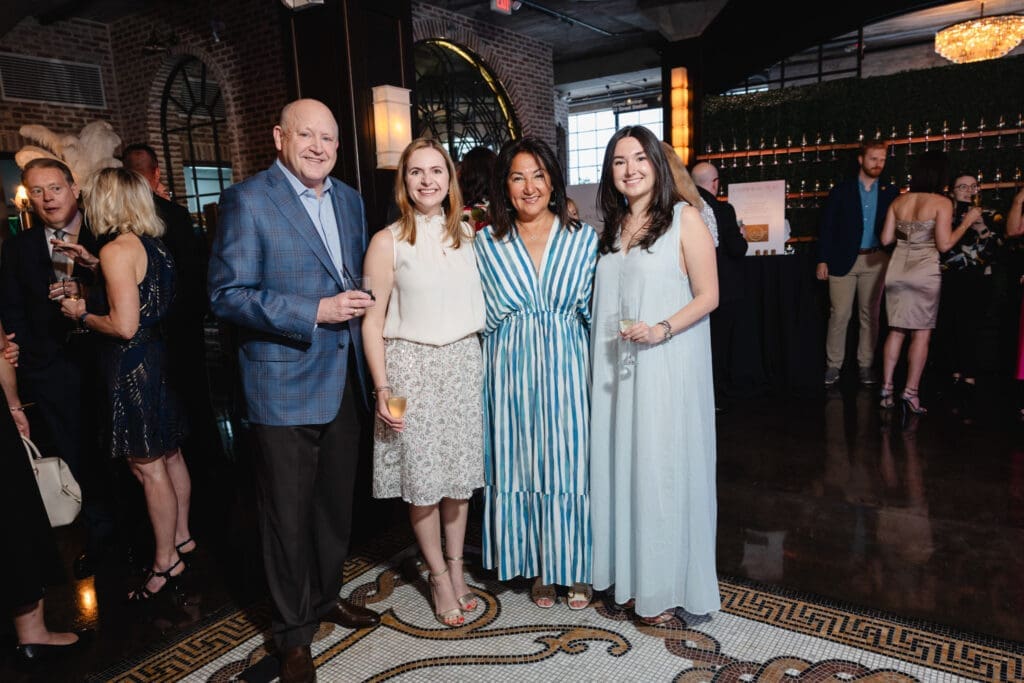 Tim Neumann, Kara Neumann, Paulina McGrath and Anna McGrath at The Women's Fund 10th annual wine dinner. (Photo by Johnny Than)