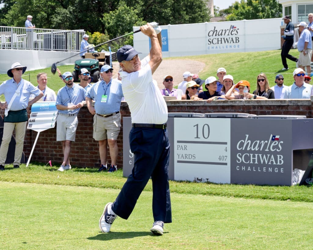 A golfer tees off at No. 10 as a packed gallery lines the ropes during the Charles Schwab Challenge at Colonial. (Photo by Walt Burns)