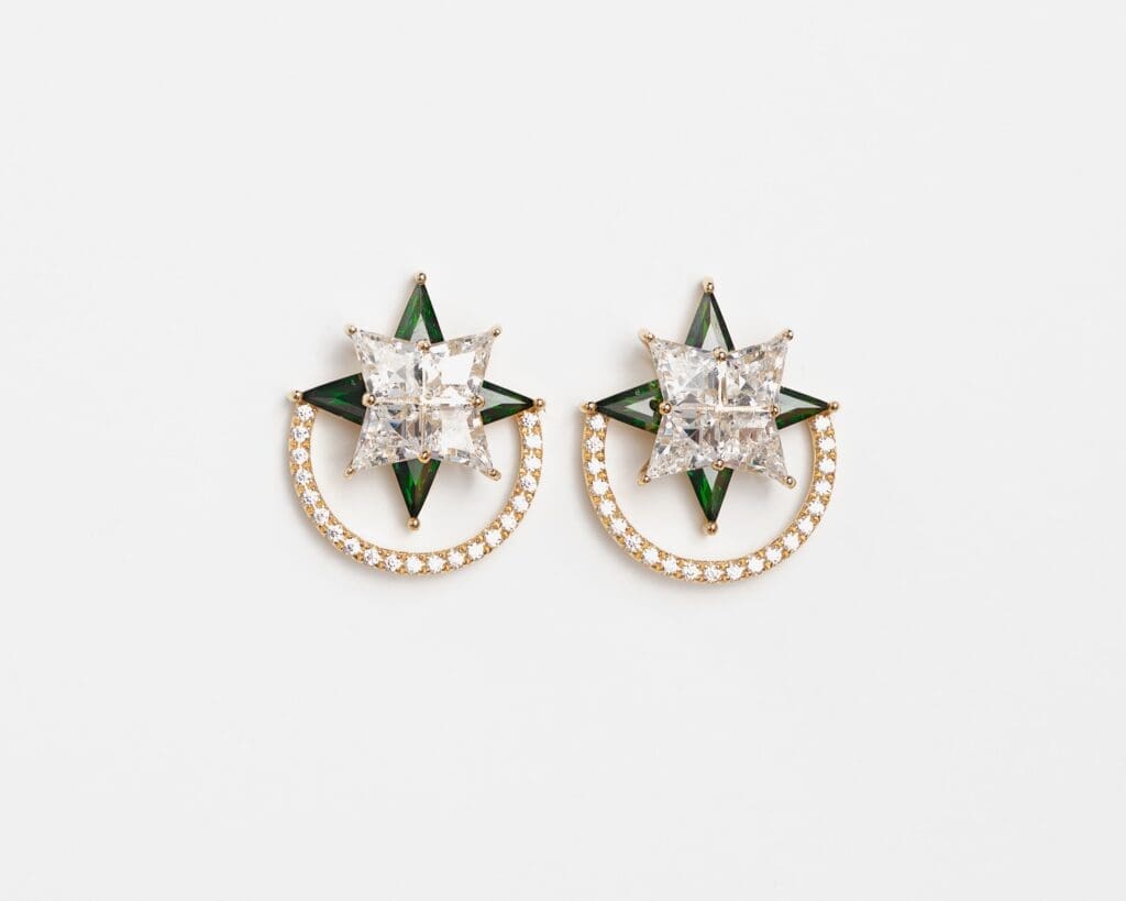 Diamond and emerald star earrings with diamond halo from 11 Juillet.