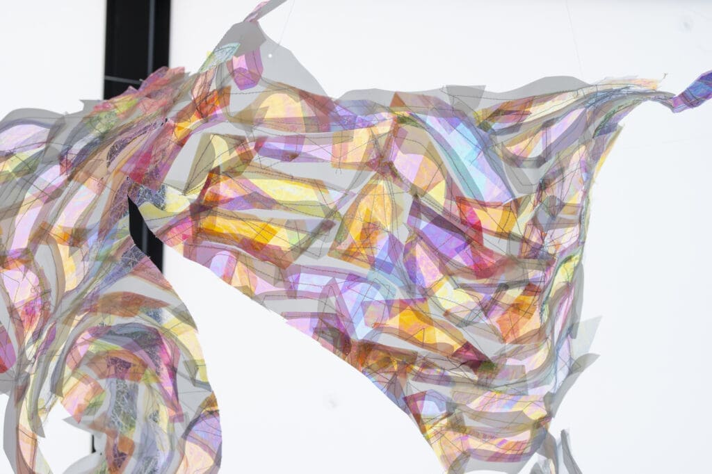 Holly Wong's work, Spell Tapestry, on view at her Sacred Letters exhibition at  Ellio Fine Art, draws viewers in.
