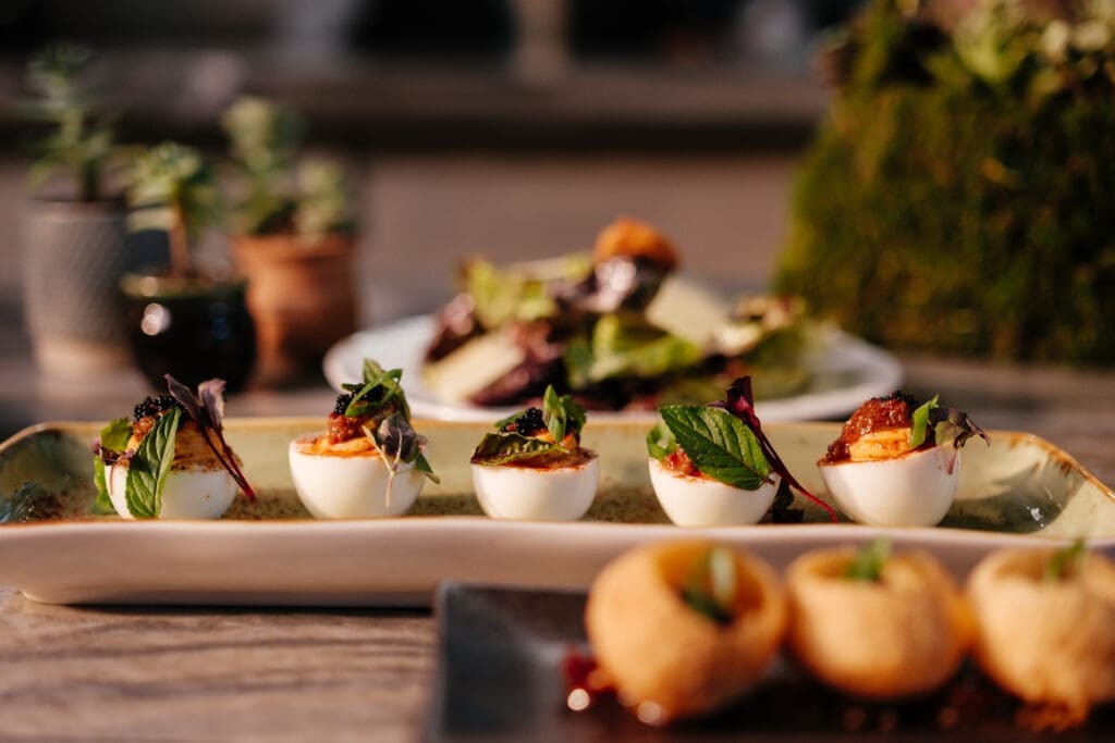 Succulent's XO deviled eggs accented with scallion, caviar, and fresh herbs ($12) show its menu's depth. (Photo by Jenn Duncan)