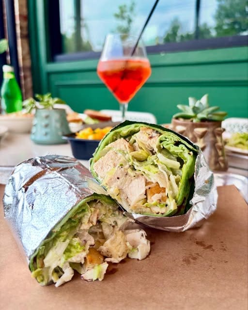 Roy Pope’s Chicken Caesar Wrap is a neighborhood favorite. (Courtesy)