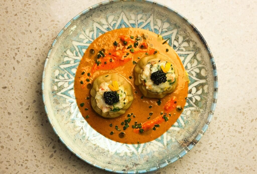 The ingredient-driven menu at Kitchen Rumors includes starters you won’t want to miss. These include the Asian-inspired steamed lobster dumplings ($24) each topped with a small dollop of caviar before it is placed on a pool of creamy malabar curry. (Photos by Chris Furia)