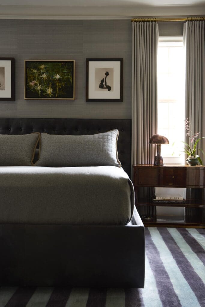The guest bedroom's custom bed is by  Beaudry Gallery. Casa di Lino custom bedding in Holland & Sherry fabrics. (Photo by Kristopher Ellis)