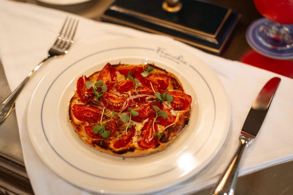 The Provençale tomato tart with goat cheese and basil is a highlight at Frenchie. (Photo by Beckley)