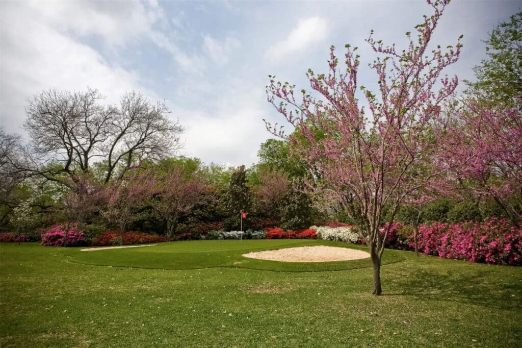Mount Vernon is built to entertain, with tennis courts, a heated pool, and a putting green, in addition to the outdoor grill with two fireplaces and a pizza oven. (Photo by Allie Beth Allman & Associates)