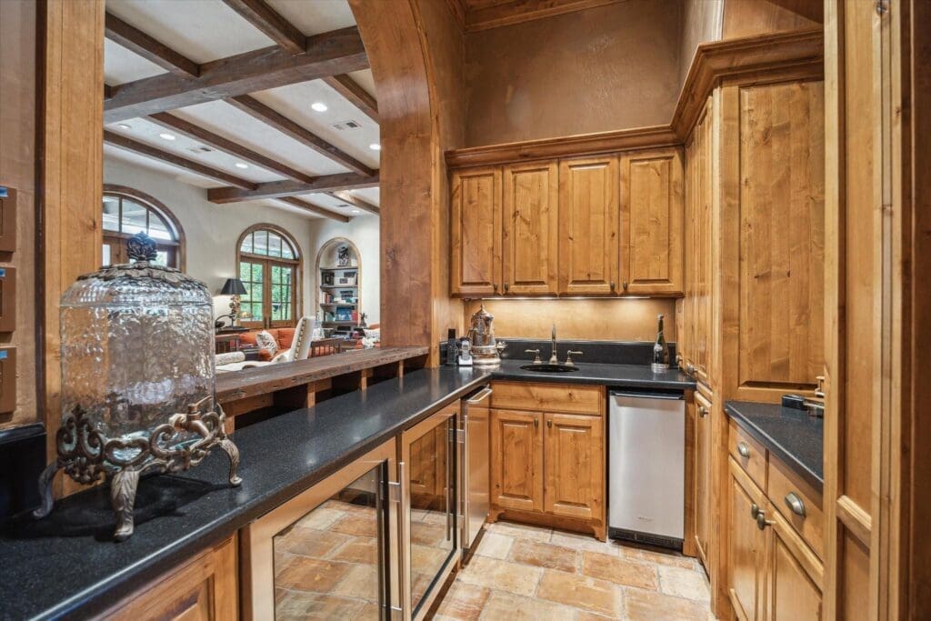 The paneled wet bar at 3 E Rivercrest Drive