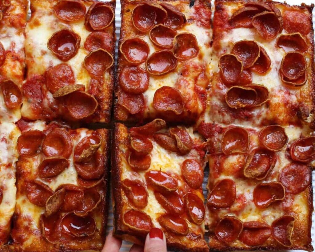 Jet’s Pizza Express serves their signature Detroit-style pizza with a thick, crispy crust. (Photo courtesy of Jet’s Pizza Express)