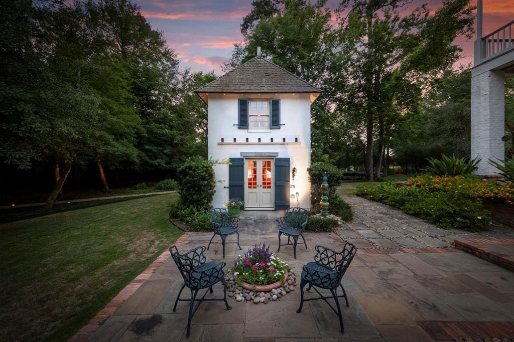 This charming custom playhouse is a backyard dream. 