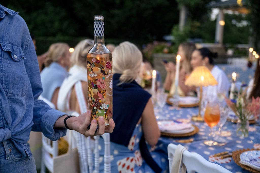 Even the wine bottles were beautifully designed for the Hunter Bell dinner party in Nantucket. (Photo by Charity Grace Photography)