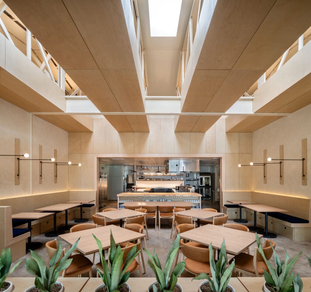 For Houston's Camaraderie restaurant, Schaum Architects transformed a former metal and woodworking workshop in the Heights — basically a wood-framed, gable-roof garage. (Photo by Leonid Furmansky) 