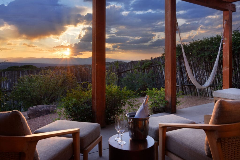 Dine outside with the mountain views in the background. (Photo by Four Seasons Resort Rancho Encantado Santa Fe)