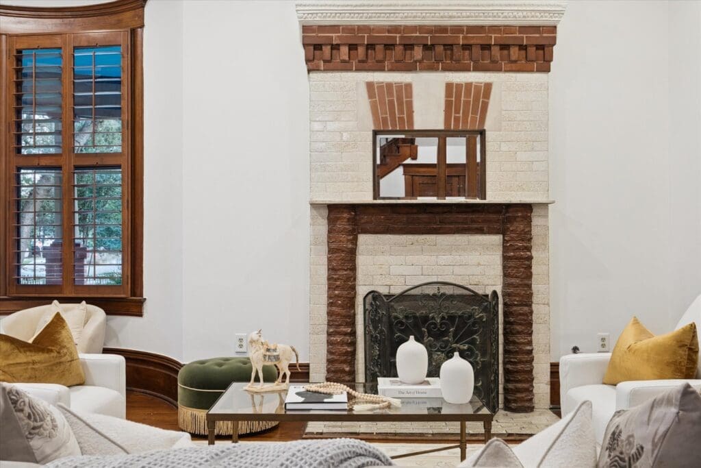The living room fireplace at 1011 Heights Blvd. showcases the original owner's talents as a brick mason (Photo by TK Images)