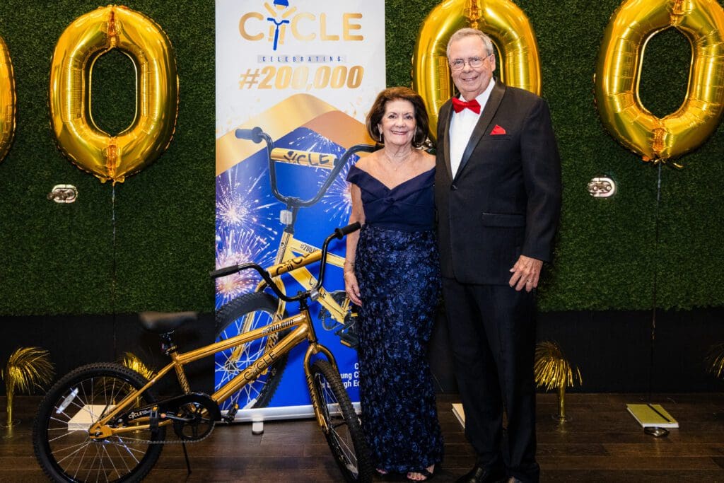 CYCLE Bicycle Ball chair and board member Maria Quinones & Dr. Miguel Quinones