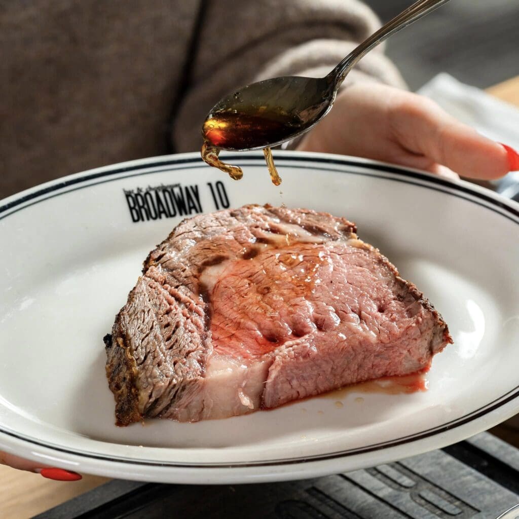 Broadway 10 brings hand-cut steaks, sushi, and modern dining to downtown Fort Worth this fall. (Courtesy)
